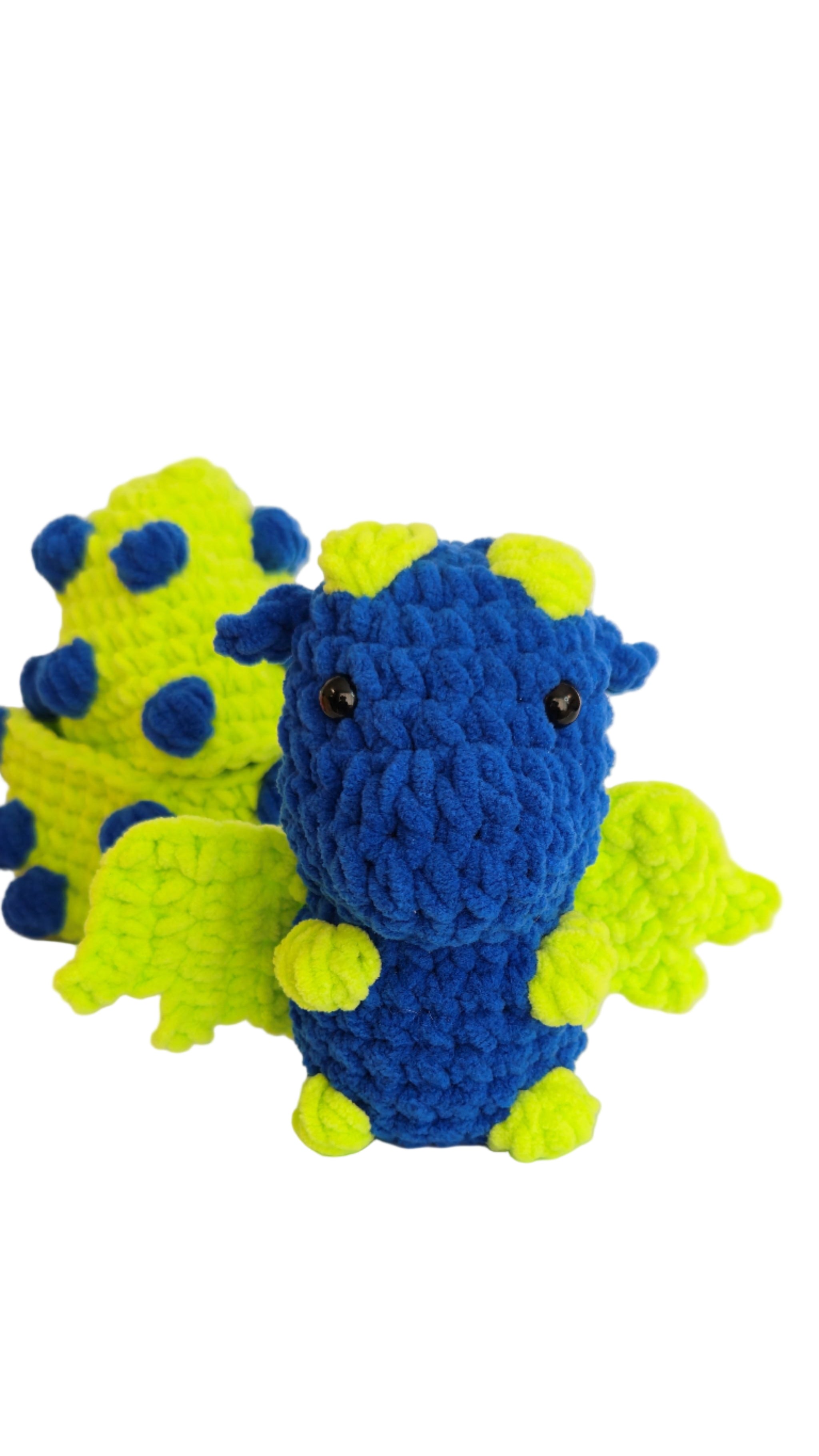 Blue and green crocheted dragon toy